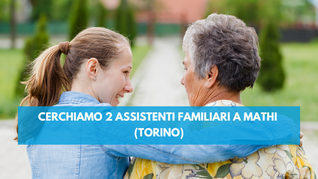 Immagine di un assistente familiare ai giardini pubblici con una signora anziana